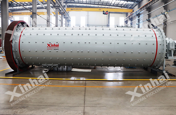 Cone overflow ball mill, a new type mill as representative of Xinhai has won much favor from concentrating mills in recent years. This kind carries forward advantages of traditional overflow ball mill and surmounts partial disadvantages of it. Now we take cone overflow ball mill of Xinhai as an example to introduce what cone overflow ball mill is.  The Structure of cone overflow ball mill The feeder end, cylinder tube wall with proportional length and diameter, cone tube wall with reasonable cone angle, ore discharge end, drive system and lubrication system, etc. all constitute Cone overflow ball mill. The shape of the tube body could be the most obvious difference compared with the traditional, and instead of the only cylinder as the tube body, it adds cone tube wall into its tube body near the ore discharging part.  overflow type ball mill produced by Xinhai Mining  Advantages of cone overflow ball mill The special design introduced above can make materials and steel ball classified in cone tube wall. That is to say the more steel balls close to ore discharging mouth, the less its diameter turn to be. An ideal effect of grinding can be achieved, due to the larger acreage of contact between mineral and steel ball resulting from the less volume, in accordance with the theory of grinding. Therefore, this cone design increases the effect of grinding, to mill minerals more finely. In this level, we can say it strengthens advantages of the traditional. Moreover, cone overflow ball mill produced by Xinhai quite decreases friction force, to get prominent energy conservation for applying dual-listed Tiaoxin spherical roller bearing, the replacement of sliding bearings. It also boosts the effect of grinding to cut down energy consumption in appliance with corrugated liner board, which enlarges contacting surface between minerals and steel balls by improvement of minerals. Similarly, we say it surmounts disadvantages of the traditional in this level.